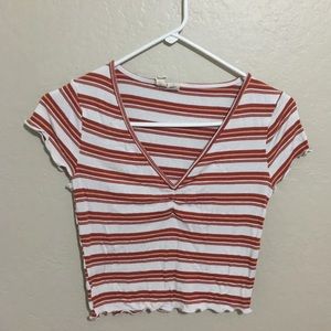 Stripes cropped top. Lettuce ruffles at the bottom
